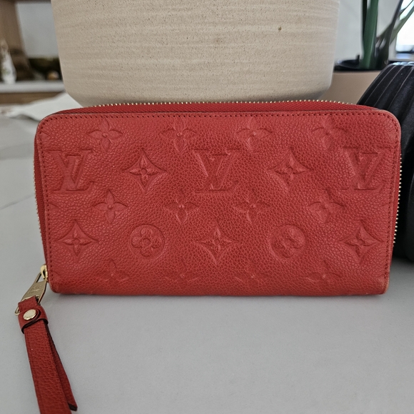 Louis Vuitton Handbags - LOUIS VUITTON RED IMPREINTE ZIPPED WALLET EXCELLENT